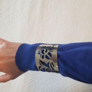 Metal Wrist Cuff Bracelet With Floral Cutouts